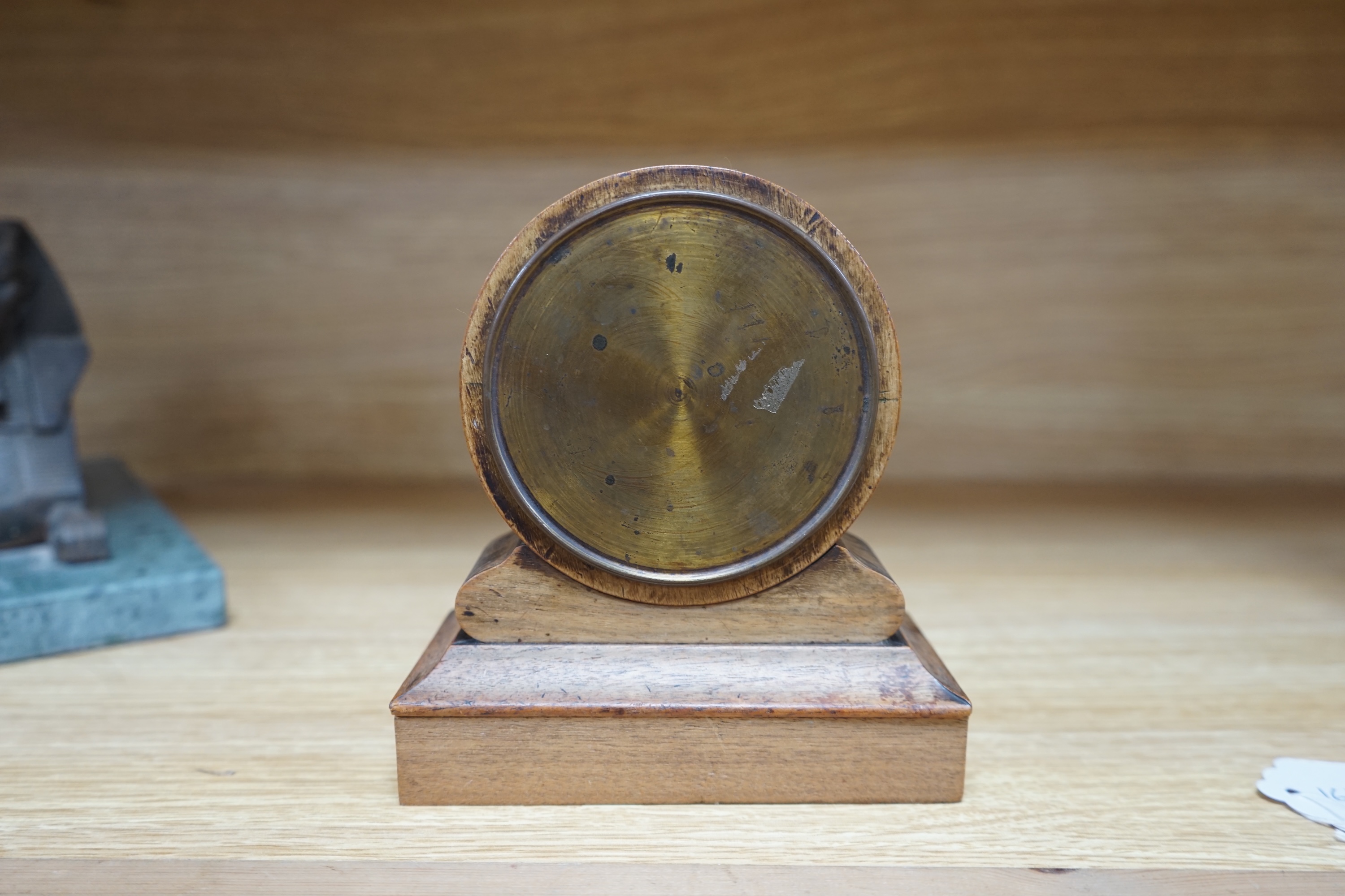 A French tic-tac movement timepiece, 19th century, in a walnut case, 15.5cm high. Condition - fair.